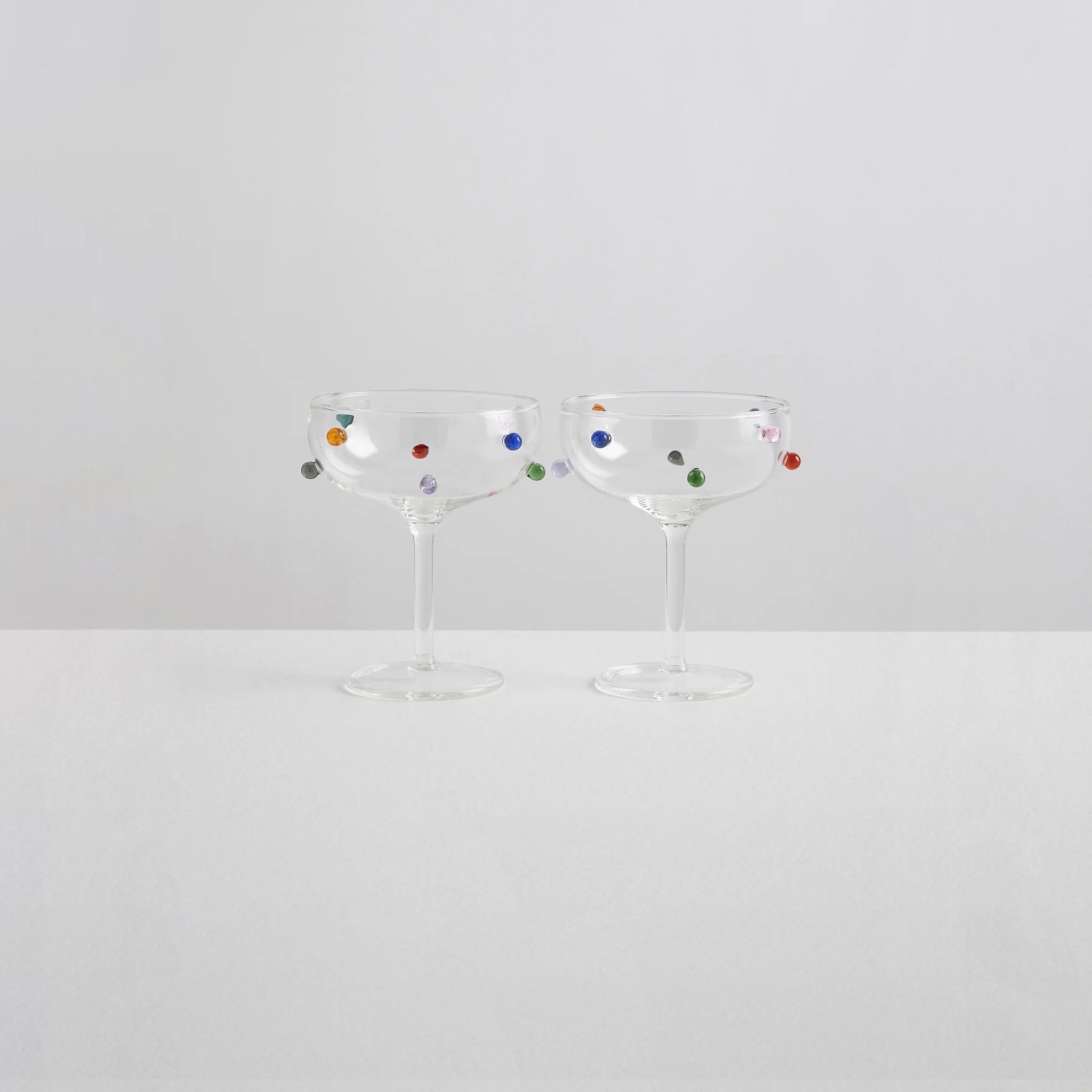 2 Pomponette Champagne Coupes - Clear & Multi