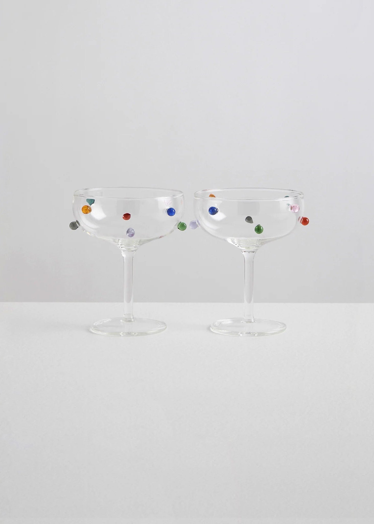 2 Pomponette Champagne Coupes - Clear & Multi