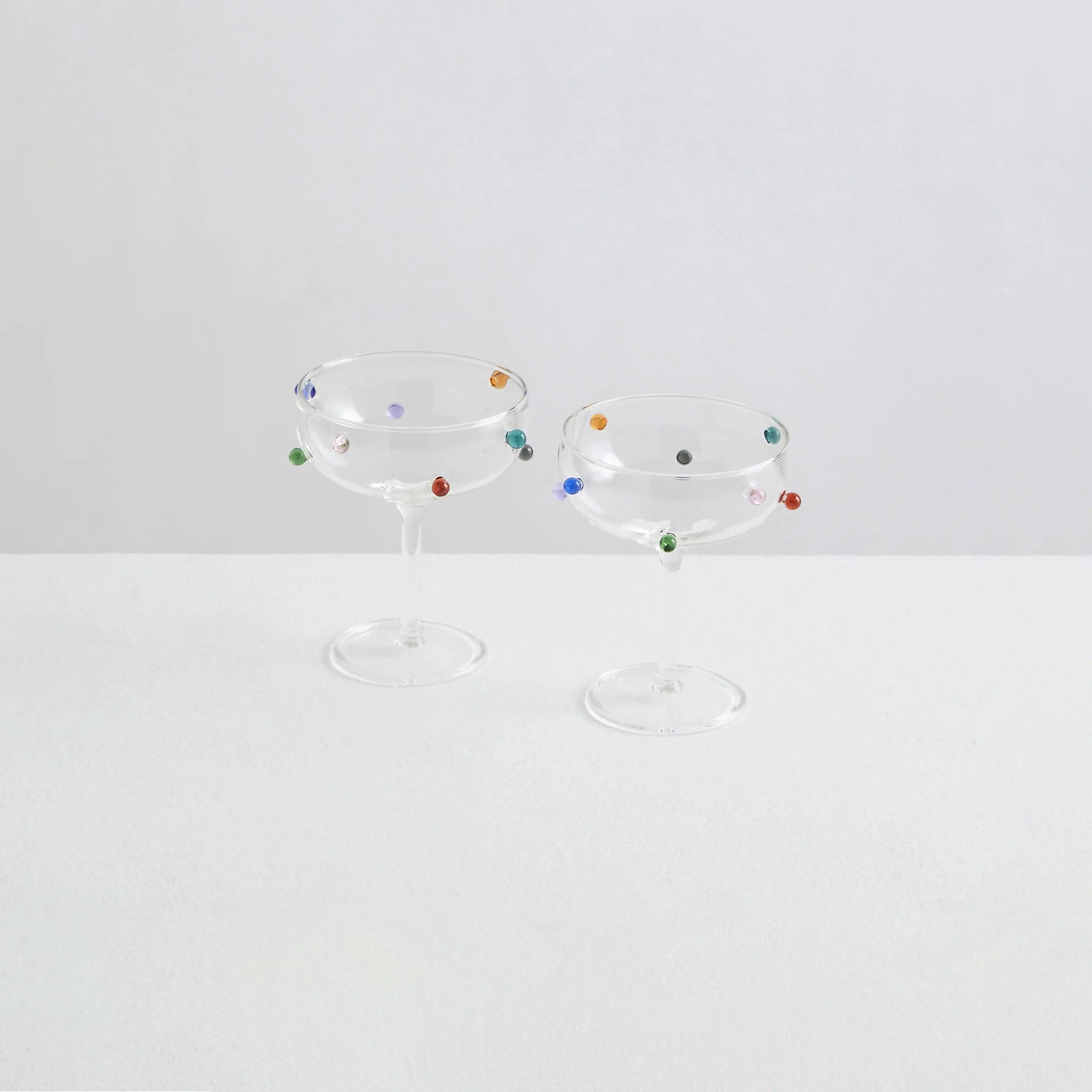 2 Pomponette Champagne Coupes - Clear & Multi