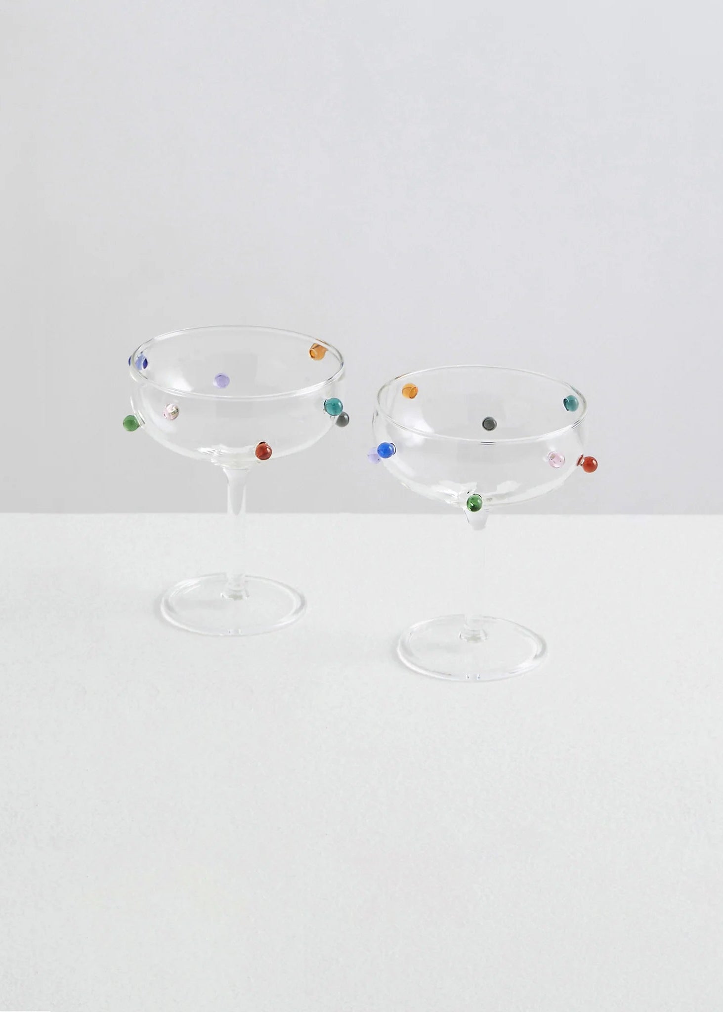 2 Pomponette Champagne Coupes - Clear & Multi
